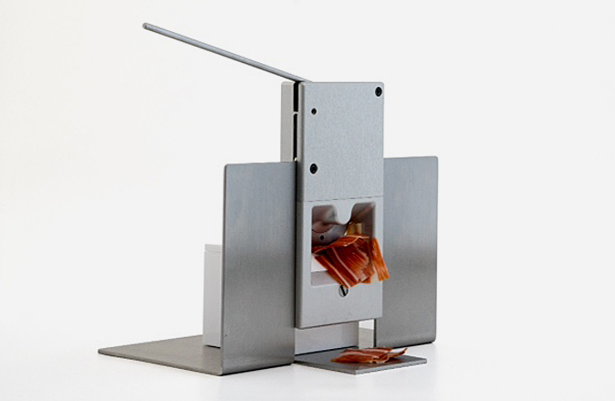 Ibérico singular lanza  Singular, la primera cortadora portátil mecánica